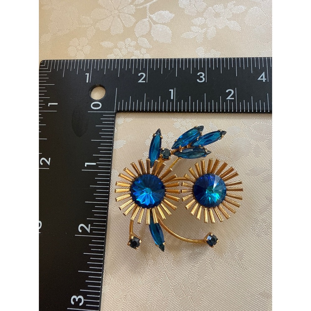 Vintage Gold Tone Blue Rhinestone Sunburst Flower Brooch Pin Unsigned MCM